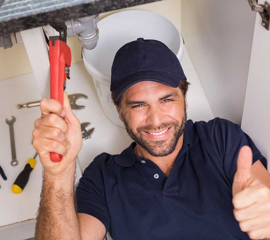Professional plumber working on geyser and water systems in Gauteng